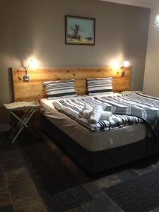 Postel nebo postele na pokoji v ubytování Edi's B&B