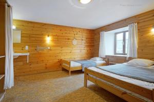 Postel nebo postele na pokoji v ubytování ferme st martin