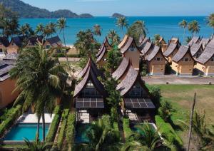 an aerial view of a resort with the ocean in the background at Koh Chang Beach Villas in Ko Chang