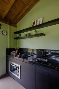 Una cocina o zona de cocina en Pousada Natural Park