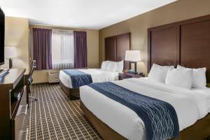 Postel nebo postele na pokoji v ubytování Comfort Inn Fort Collins North