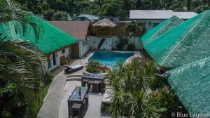 an aerial view of a backyard with a swimming pool at Blue Lagoon Dive Resort in Sabang
