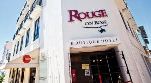 a building with a rosie onrosis boutique hotel at Rouge on Rose Boutique Hotel in Cape Town