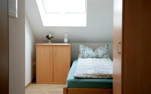 Postel nebo postele na pokoji v ubytování Ferienwohnung Steinhausen