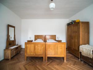 Posteľ alebo postele v izbe v ubytovaní Ubytování na Dobro-družném statku