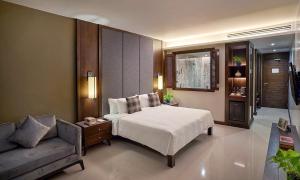 Ein Bett oder Betten in einem Zimmer der Unterkunft Khanom Beach Resort And Spa