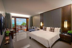 Ein Bett oder Betten in einem Zimmer der Unterkunft Khanom Beach Resort And Spa