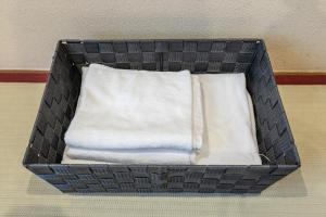 a box with two white pillows in a room at Seiki Kyoto Station in Kyoto +119 photos