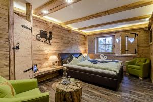 Posezení v ubytování Almhotel Grünsteinblick + 37 fotografií