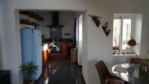 Kuchyň nebo kuchyňský kout v ubytování Casa Volta do Mar