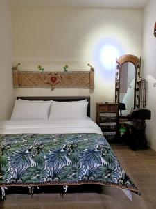 Katil atau katil-katil dalam bilik di Jilufugan B&B