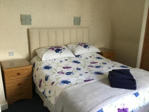 Кровать или кровати в номере Cavendish House