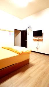 Letto o letti in una camera di Get Grace Hotel