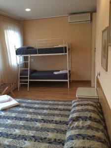 Postel nebo postele na pokoji v ubytování Hotel Concordia