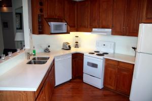 A kitchen or kitchenette at Admira Properties - Whistler
