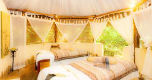 Katil atau katil-katil dalam bilik di Nomad Beach Resort