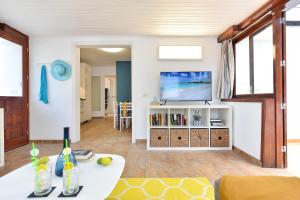 TV a/nebo společenská místnost v ubytování Casa Maspalomas