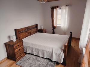 Een bed of bedden in een kamer bij Quinta do Torgal - Alojamento Local
