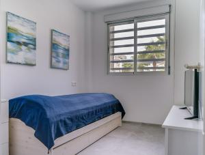 En eller flere senge i et værelse på Vivienda aguas nuevas familiar & deportivo + 128 billeder