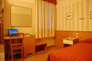 TV a/nebo společenská místnost v ubytování Hotel Belie