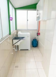 Et badeværelse på Edifício Iris - Bombinhas