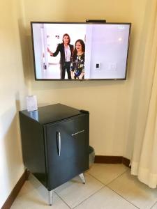 TV a/nebo společenská místnost v ubytování Pousada Abaré