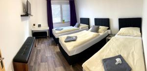Postelja oz. postelje v sobi nastanitve Hotel Stará Pošta