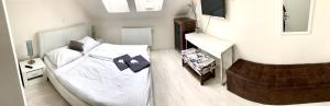 Postelja oz. postelje v sobi nastanitve Hotel Stará Pošta