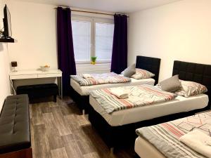 Postelja oz. postelje v sobi nastanitve Hotel Stará Pošta