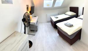Postelja oz. postelje v sobi nastanitve Hotel Stará Pošta