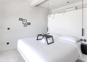 Postel nebo postele na pokoji v ubytování OCEANNA - Uluwatu, Bali