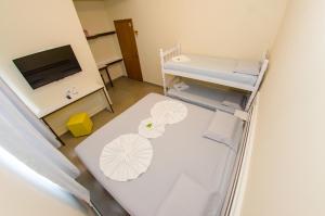 an overhead view of a hospital room with two beds at Pousada Morada dos ANJOS in Penha +120 photos