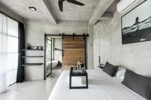 Postel nebo postele na pokoji v ubytování OCEANNA - Uluwatu, Bali