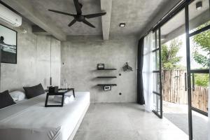 Postel nebo postele na pokoji v ubytování OCEANNA - Uluwatu, Bali