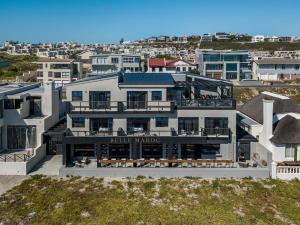 an aerial view of a building with a balcony at Belle Maroc in Bloubergstrand