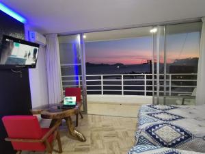 Una televisión o centro de entretenimiento en 52 Master Room