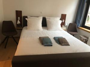Voodi või voodid majutusasutuse B&B Calis toas
