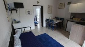 Kuchyň nebo kuchyňský kout v ubytování Apartments Lastavica + 34 fotografií