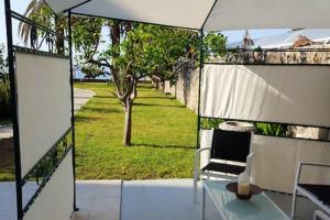 A garden outside Spacious Apartment in Tarragona + Pool