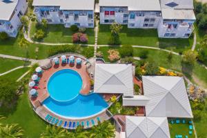 an overhead view of a pool at a resort at Karibea Sainte Luce Hotel in Sainte-Luce