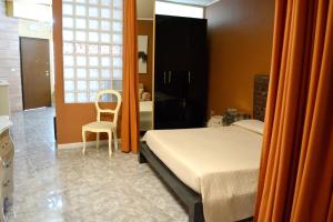 2 bedrooms appartement at Reggio Calabria 2 km away from the beachにあるベッド