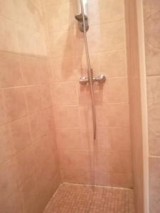 a bathroom with a shower with a glass door at 2 bedrooms property with shared pool enclosed garden and wifi at Ubeda in Úbeda