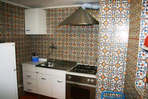 Kuchyňa alebo kuchynka v ubytovaní Comfortable Apartment in the Heart of Rome, 65m², City View