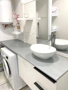 a bathroom with a bowl sink on a counter at Studio avec balcon amenage et wifi a Les Trois Ilets in Les Trois-Îlets