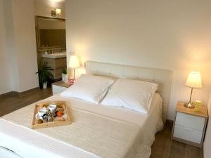 Postel nebo postele na pokoji v ubytování Villa ensoleillée à Pietralba avec piscine privée + 15 fotografií