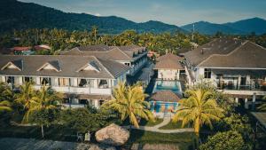 an aerial view of a resort with a swimming pool at Alia Residence Business Resort in Kampung Padang Masirat