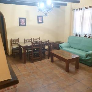 A seating area at Charming House in Hornachuelos with Shared Pool