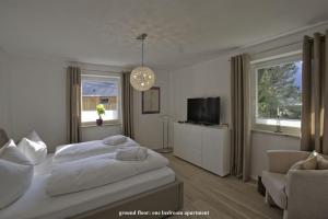 Posteľ alebo postele v izbe v ubytovaní Ferienhaus Alpenjuwel