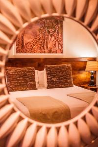 Säng eller sängar i ett rum på Bushveld Terrace - Hotel on Kruger