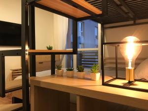 TV a/nebo společenská místnost v ubytování Studio cosy Disney/Paris. RER Val d’Europe à 150m